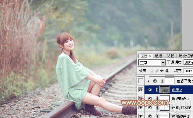 如何用Photoshop CC打造甜美的淡调青绿色铁轨美女图片