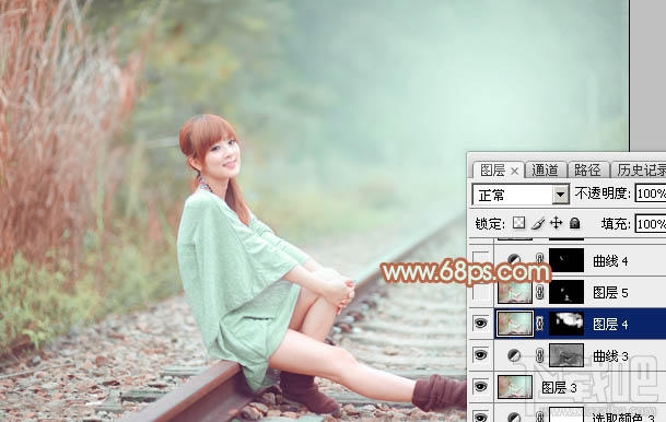 如何用Photoshop CC打造甜美的淡调青绿色铁轨美女图片